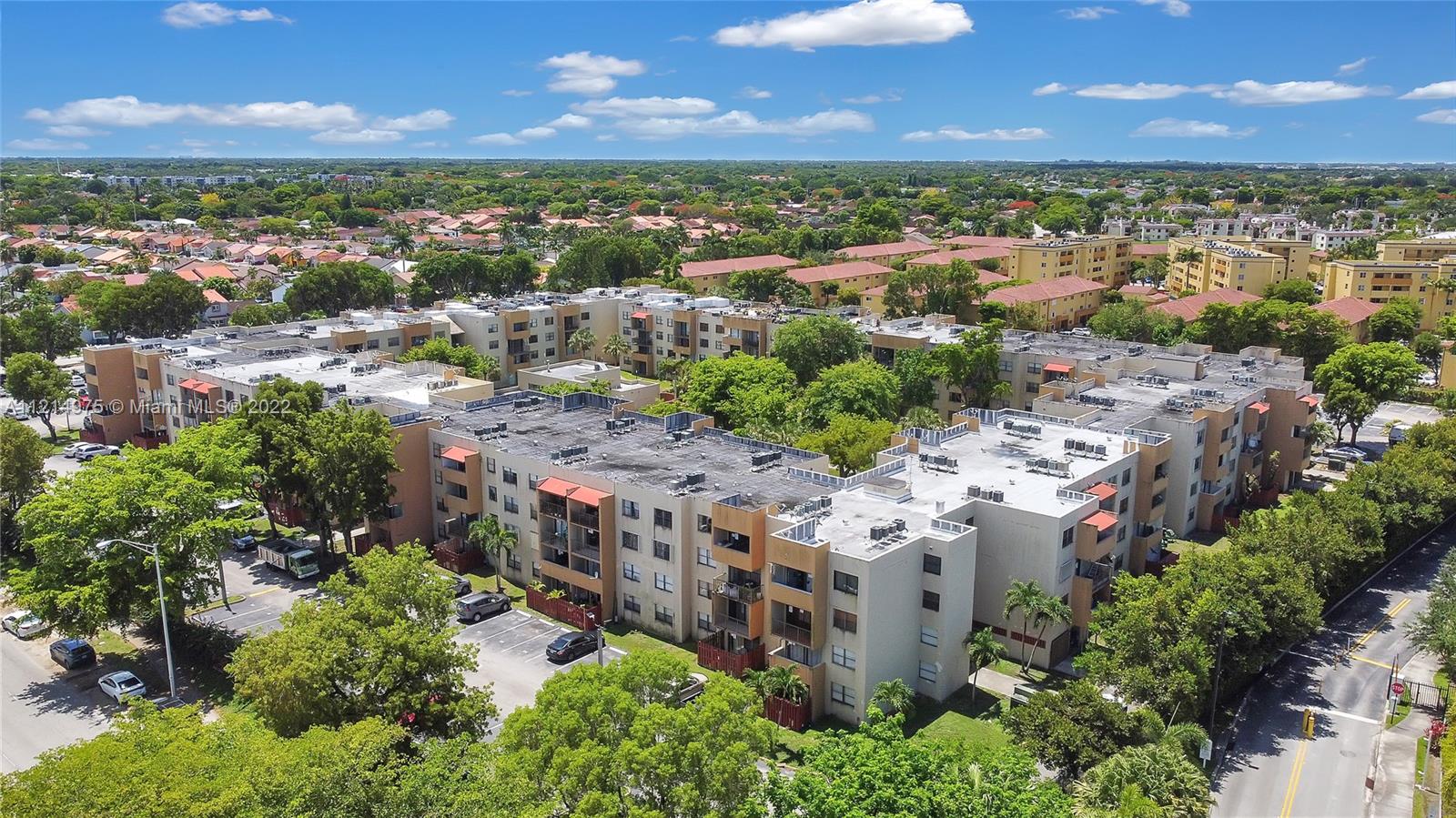 8002 Southwest 149th Avenue, Unit B201 Miami, FL 33193 - Photo 13 of 18 a view of a city with tall buildings