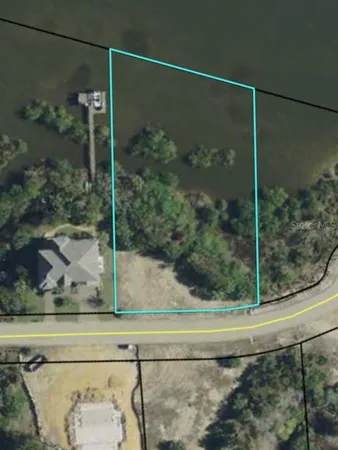 a view of a glass door and a yard