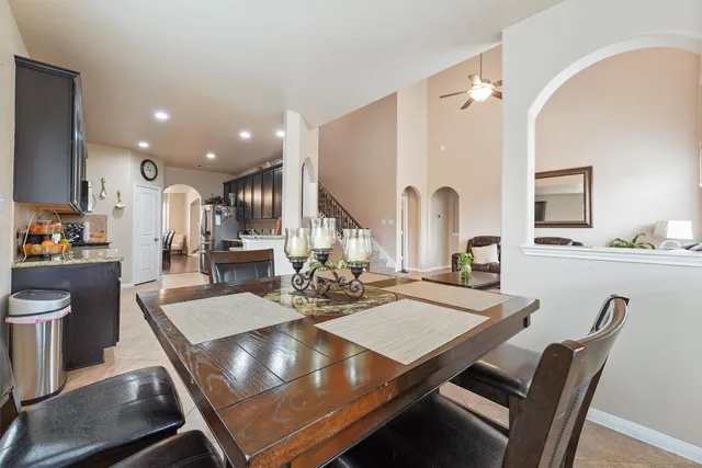 a view of kitchen dining table and chairs