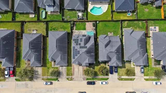 an aerial view of houses and roads