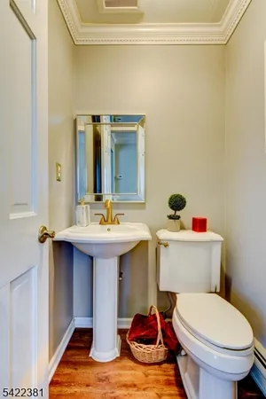 a bathroom with a sink and a toilet