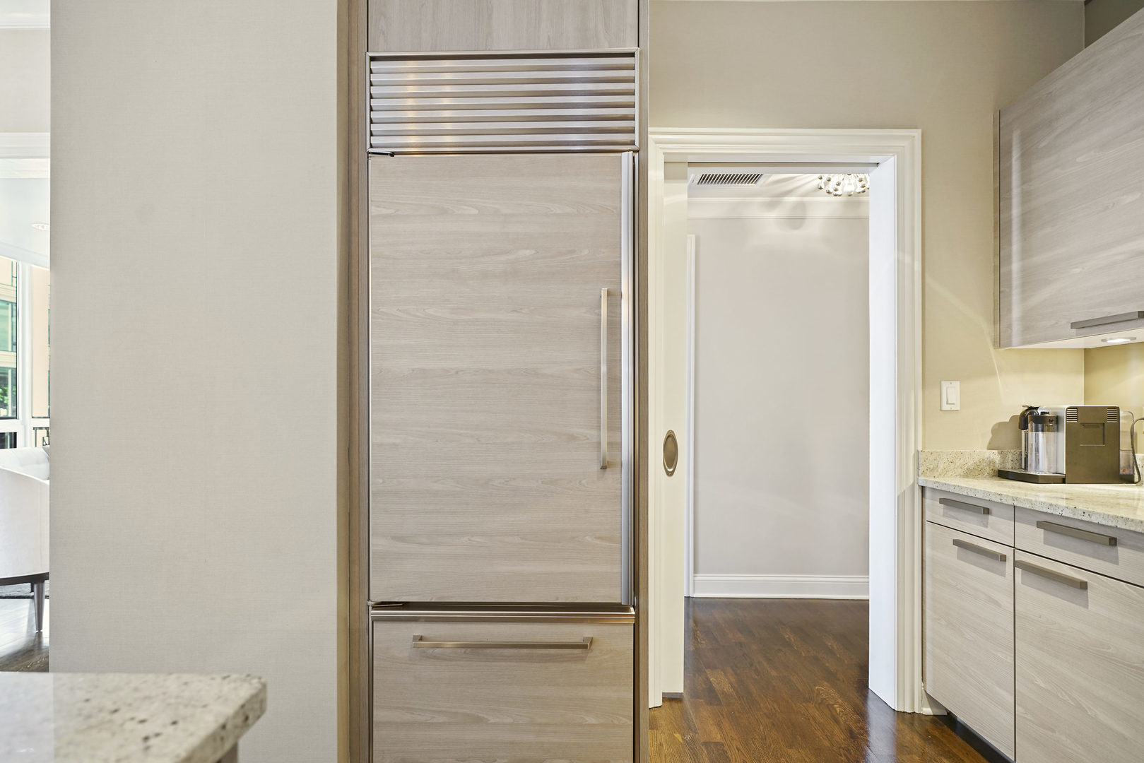 10 East Delaware Place, Unit 18E Chicago, IL 60611 - Photo 16 of 57 a room with a closet and wooden floor