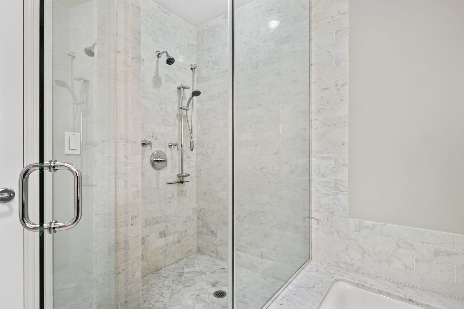 10 East Delaware Place, Unit 18E Chicago, IL 60611 - Photo 25 of 57 a bathroom with a shower