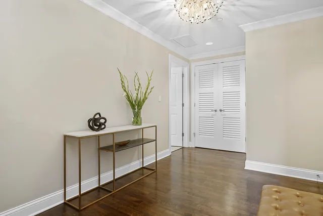 an entryway with wooden floor