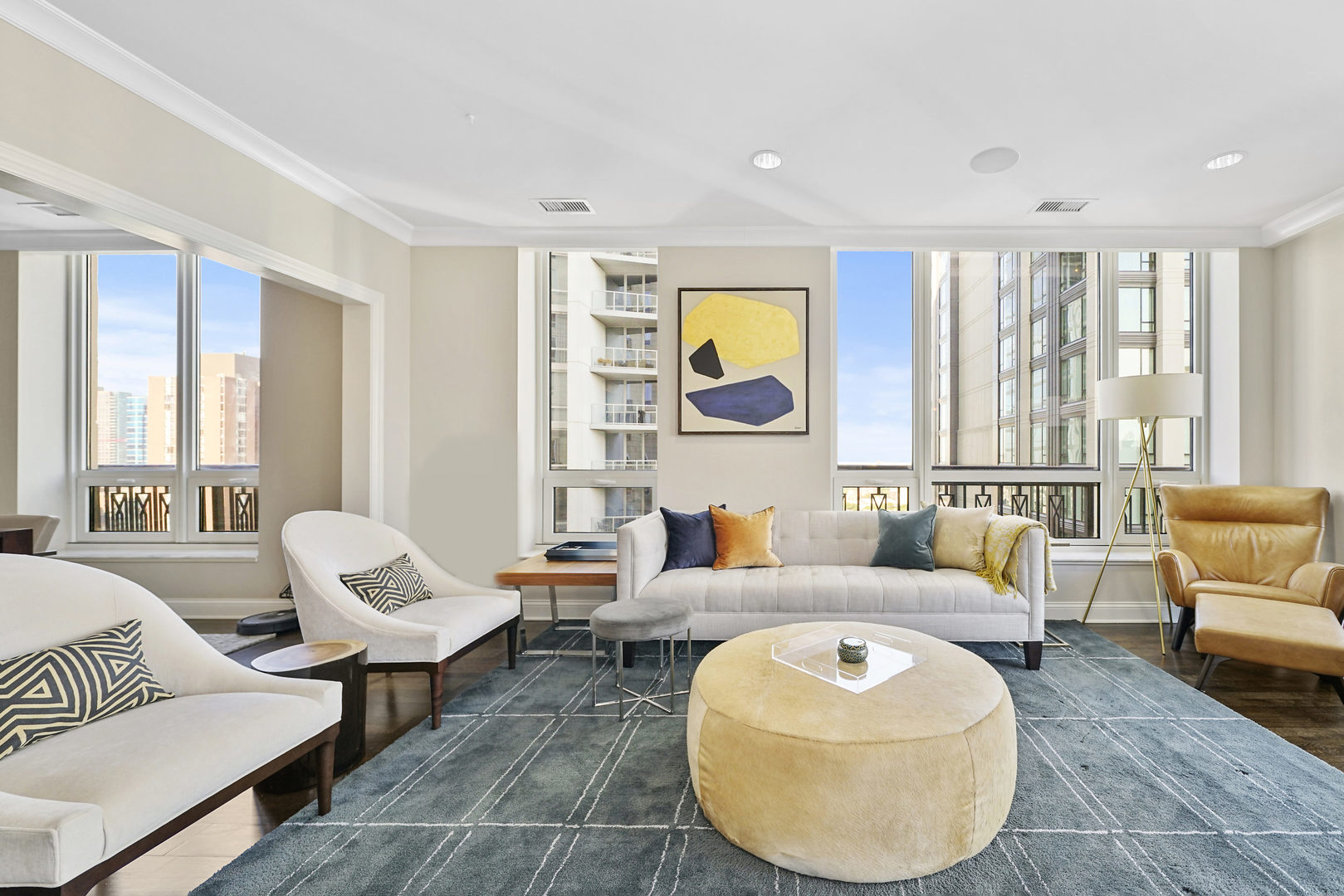 10 East Delaware Place, Unit 18E Chicago, IL 60611 - Photo 4 of 57 a living room with furniture and a large window
