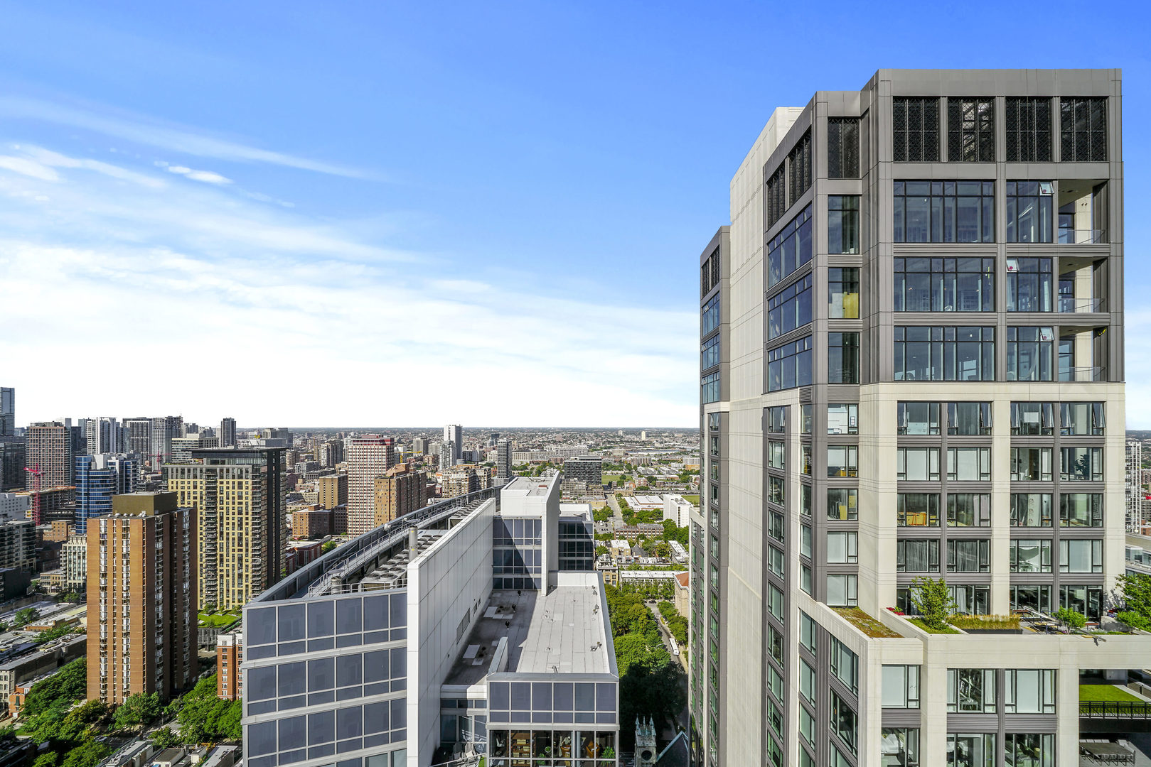 10 East Delaware Place, Unit 18E Chicago, IL 60611 - Photo 45 of 57 a view of a city with tall buildings