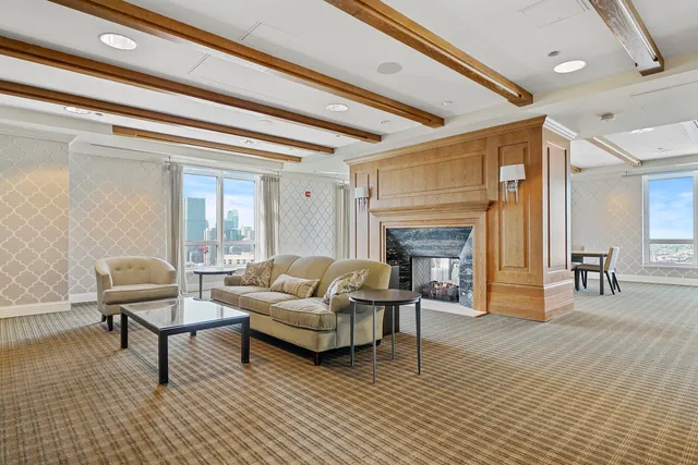 a view of living room with a large window