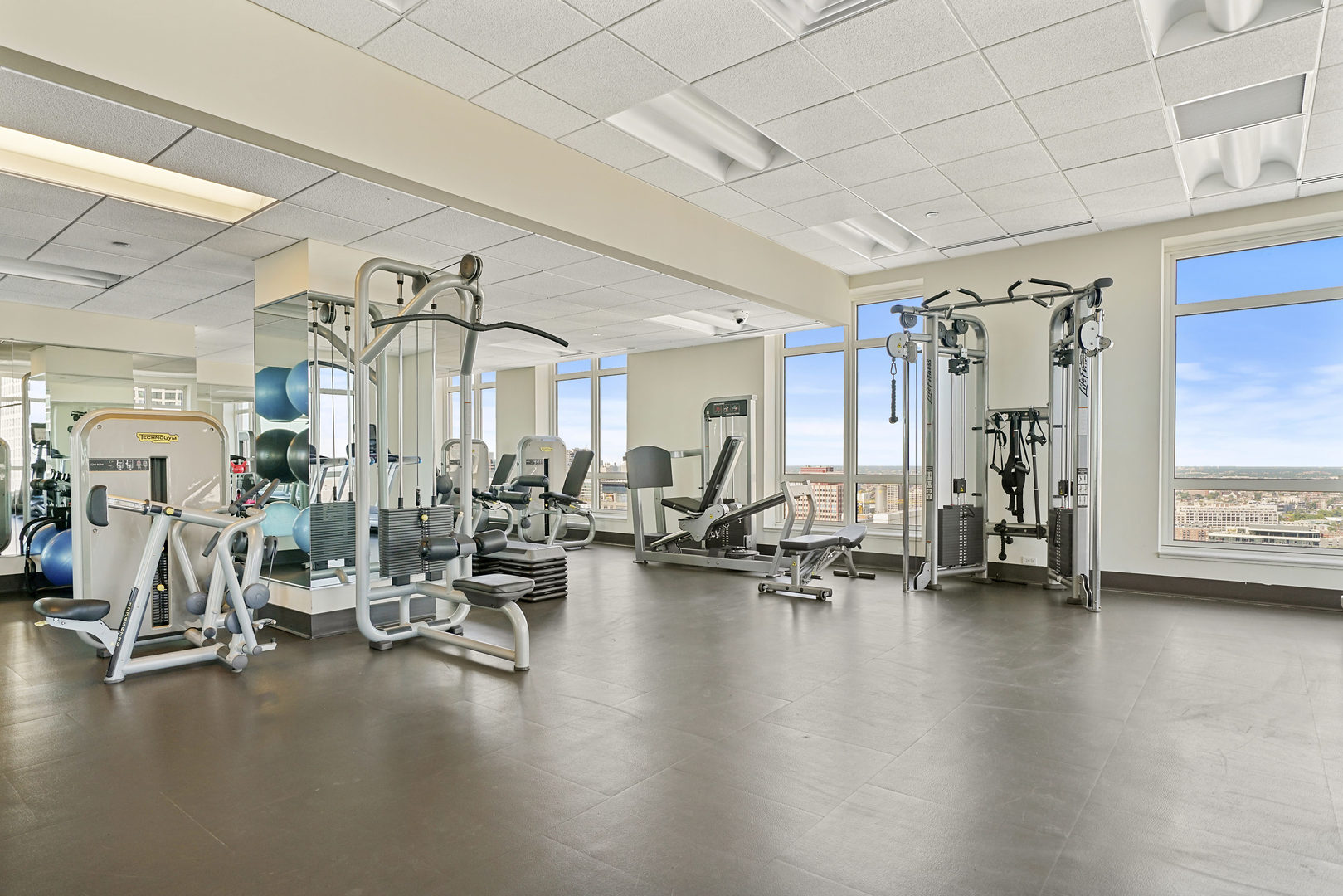 10 East Delaware Place, Unit 18E Chicago, IL 60611 - Photo 51 of 57 a view of a room with gym equipment