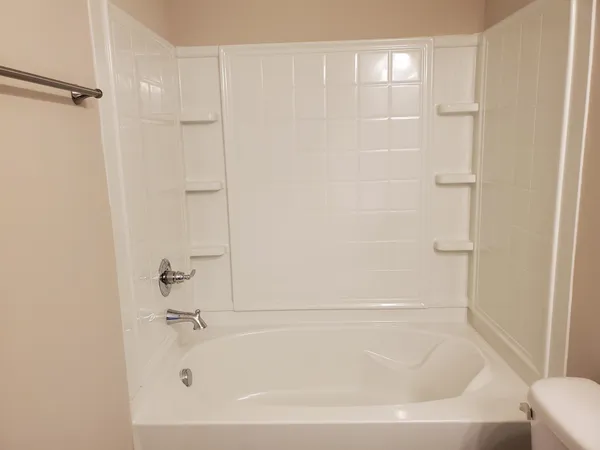 a bathroom with a sink vanity and a mirror