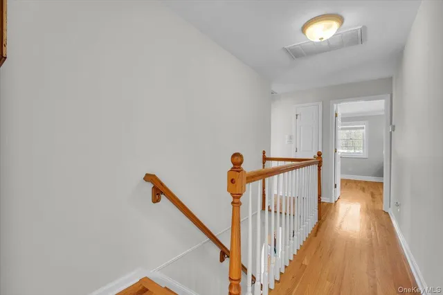 a view of a hallway with front door