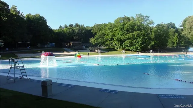 a picture of a room with a and a white wall