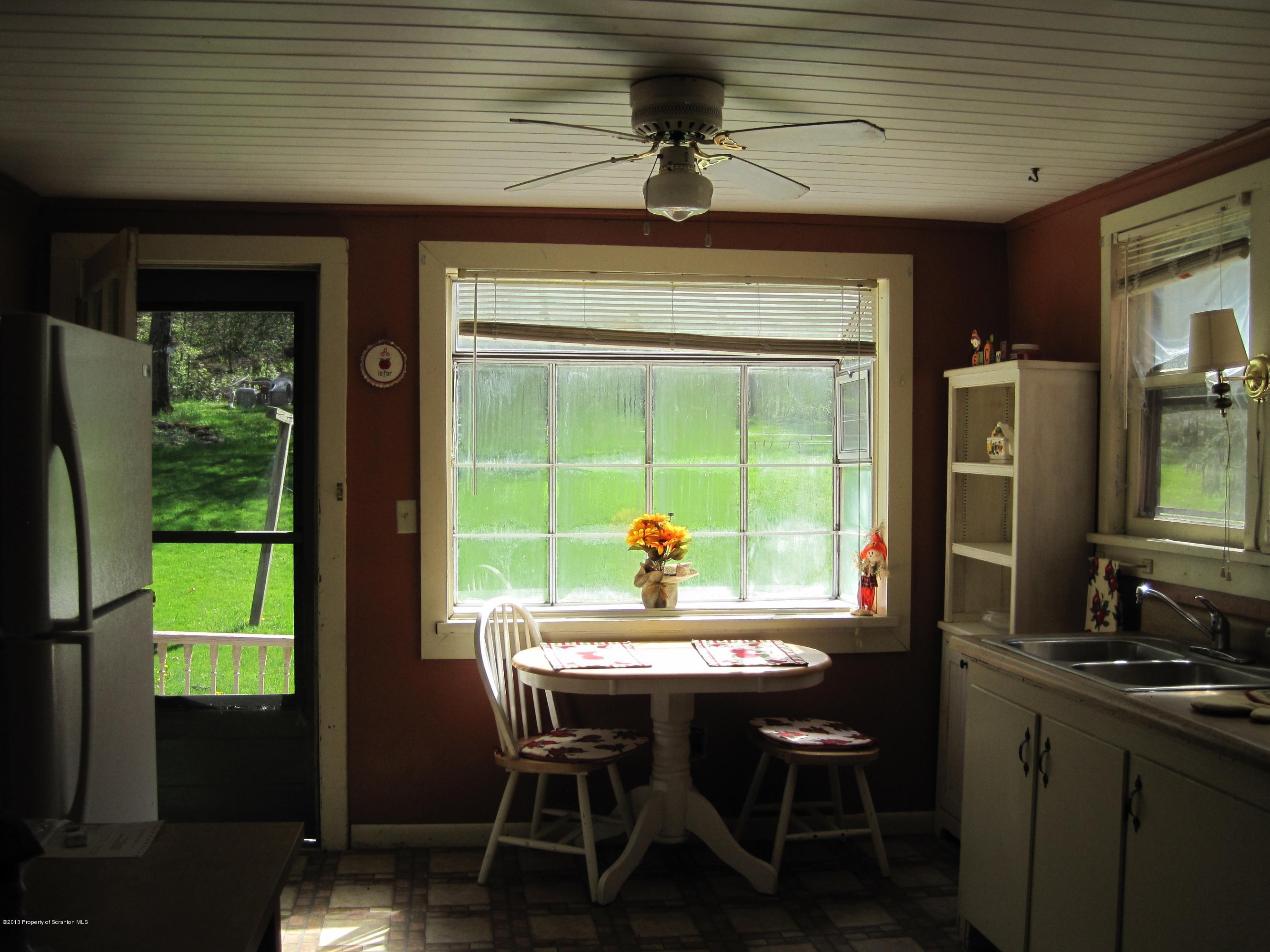 3220 Dimock To Brooklyn Road Kingsley, PA 18826 - Photo 5 of 19 a dining room with furniture and a window