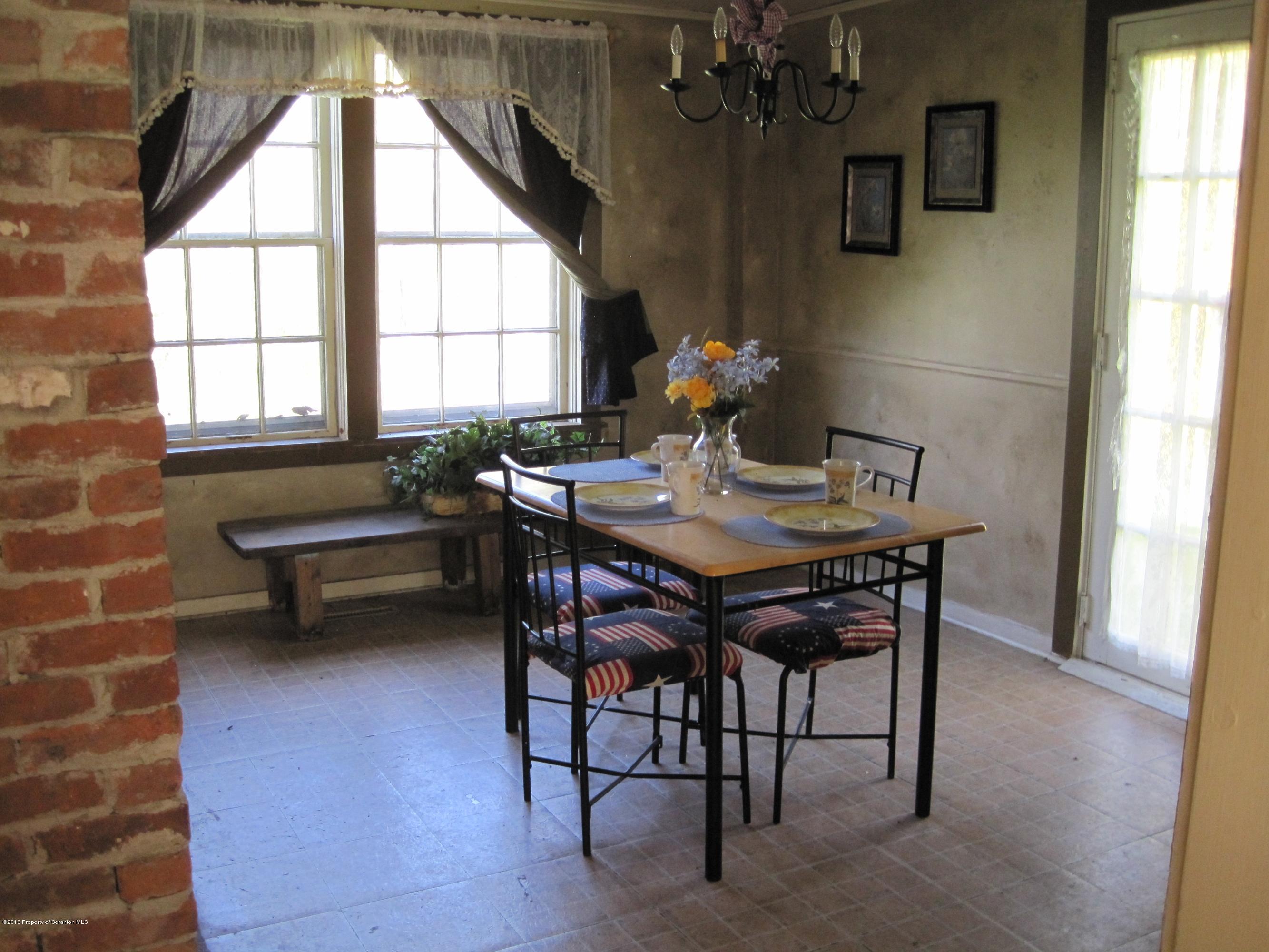 3220 Dimock To Brooklyn Road Kingsley, PA 18826 - Photo 6 of 19 a dining room with furniture and window