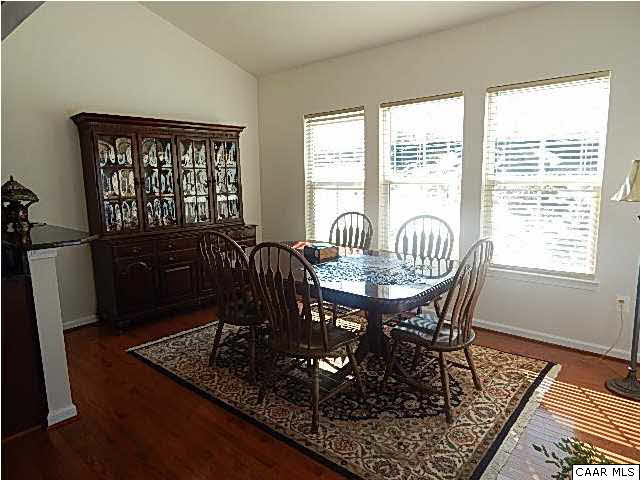 5593 Summerdean Road Crozet, VA 22932 - Photo 3 of 4 a view of a dining room with furniture window and outside view