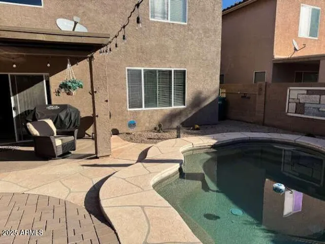a bathroom with a sink double vanity and a mirror