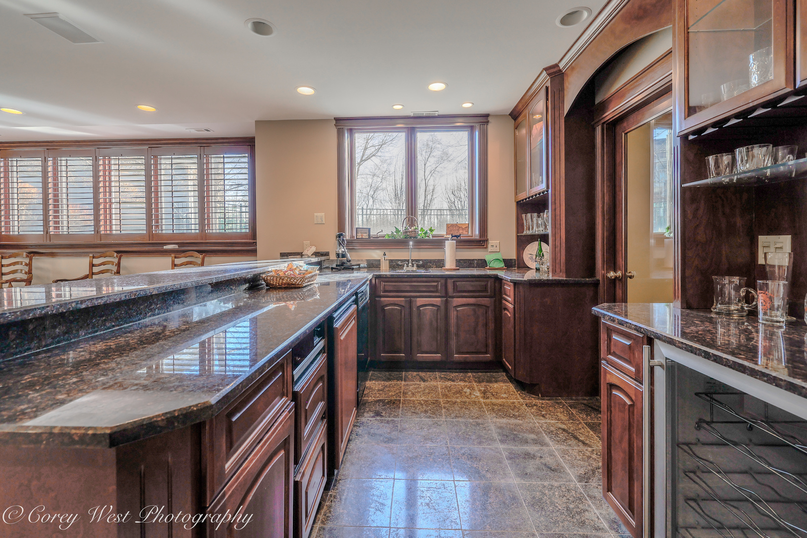 N004 Alexander Drive Geneva, IL 60134 - Photo 62 of 75 a kitchen with a sink stove and cabinets