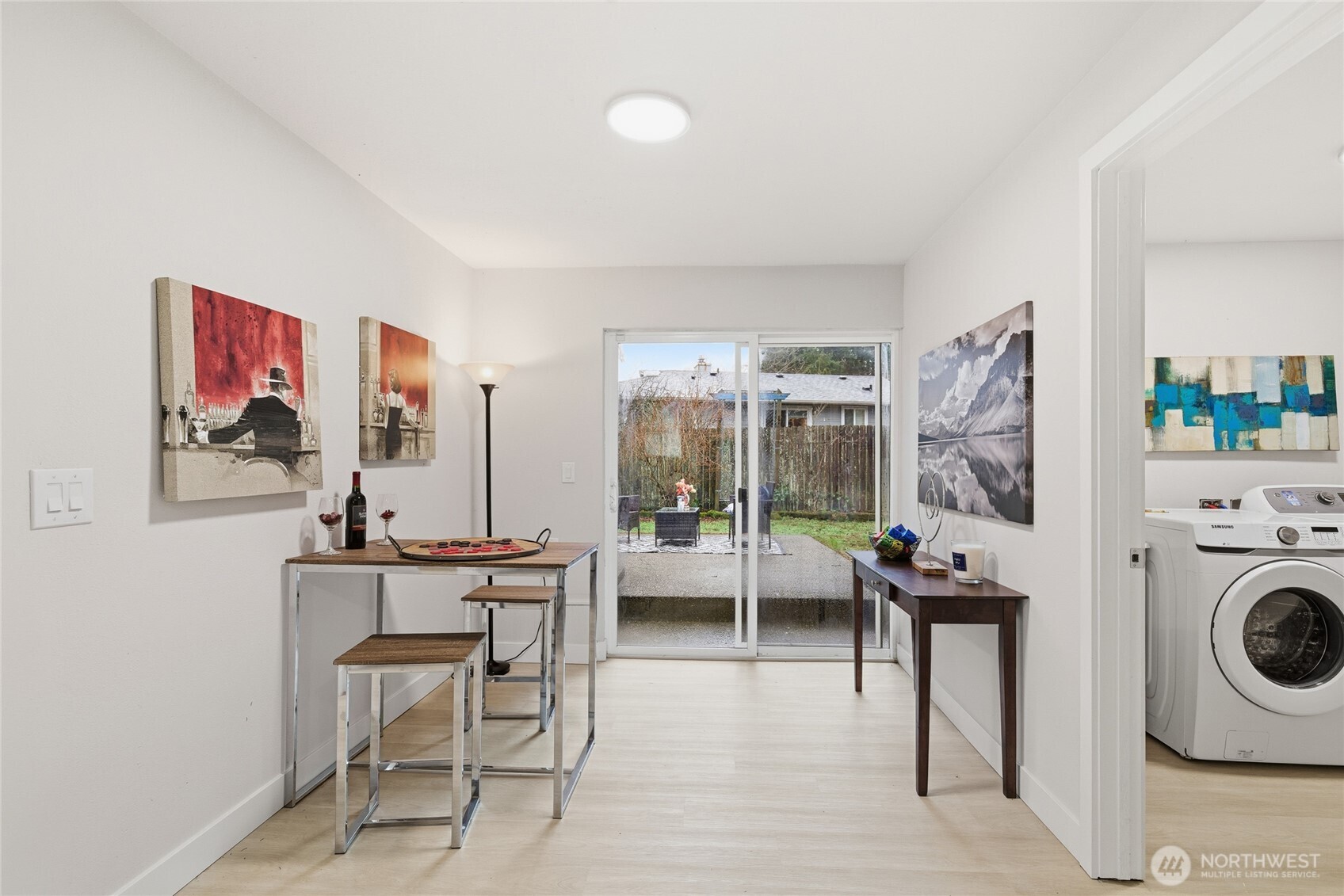 4426 Northeast 17th Street Renton, WA 98059 - Photo 24 of 36 a room with furniture a rug and a flat screen tv