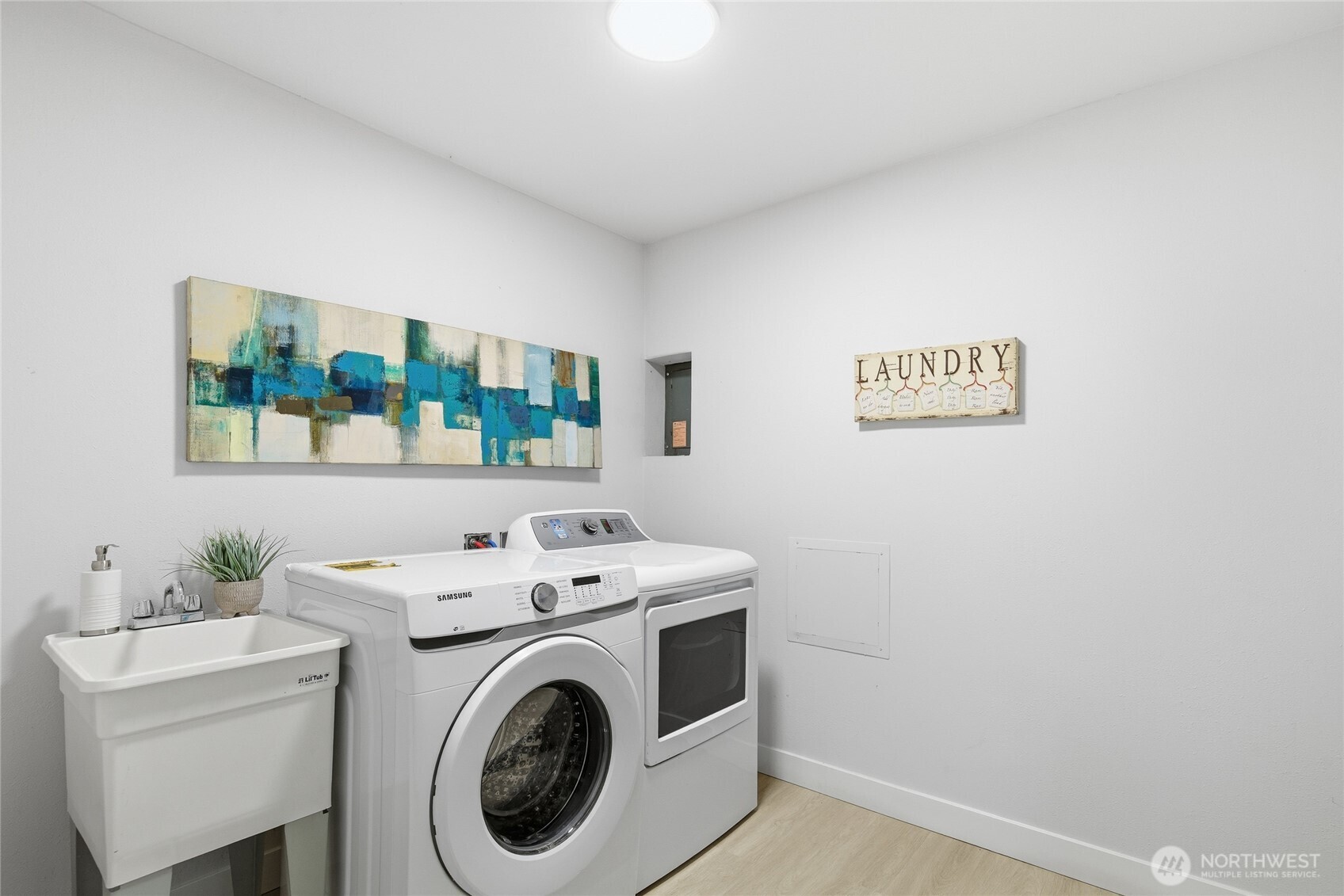 4426 Northeast 17th Street Renton, WA 98059 - Photo 29 of 36 a utility room with dryer and washer