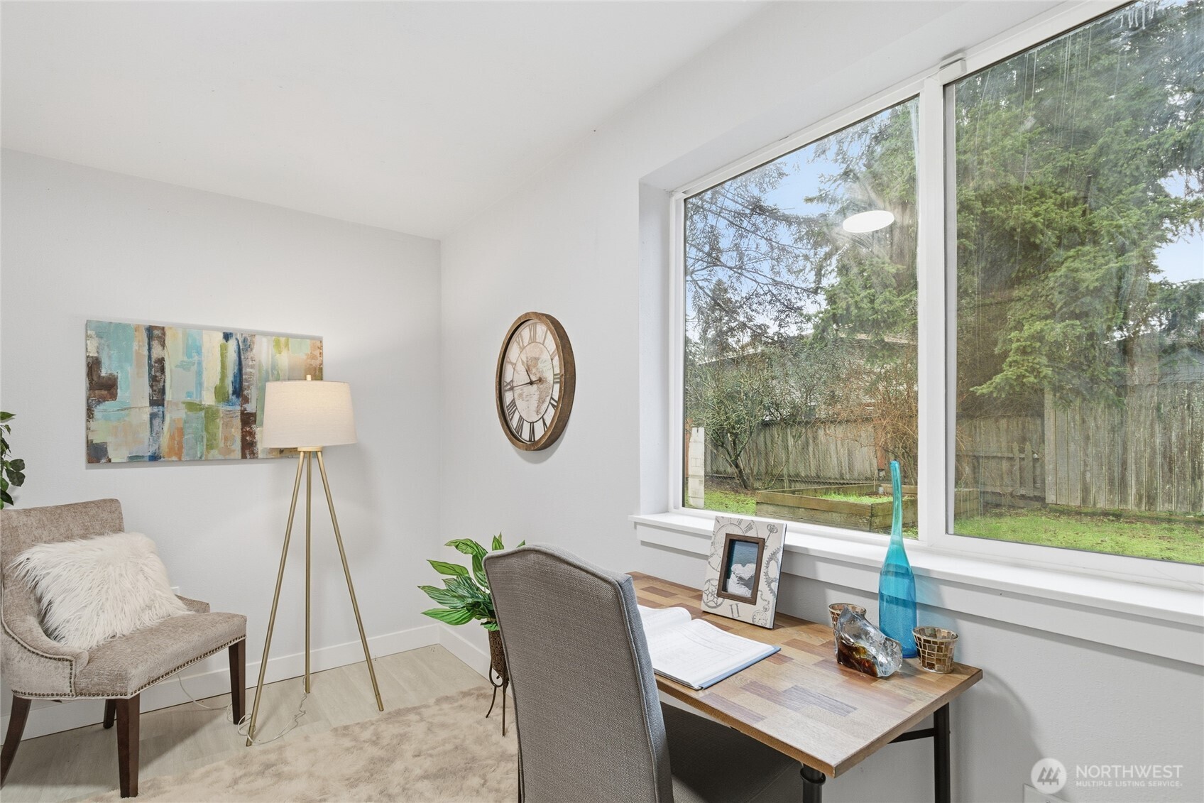 4426 Northeast 17th Street Renton, WA 98059 - Photo 30 of 36 a living room with furniture and a large window