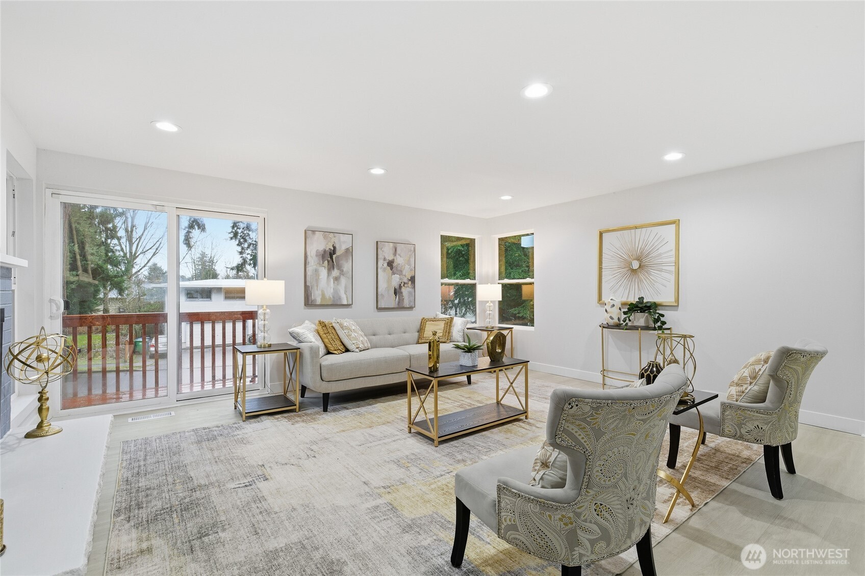 4426 Northeast 17th Street Renton, WA 98059 - Photo 5 of 36 a living room with furniture and a table