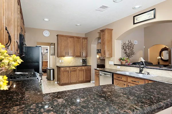 a bedroom with a bed and dresser
