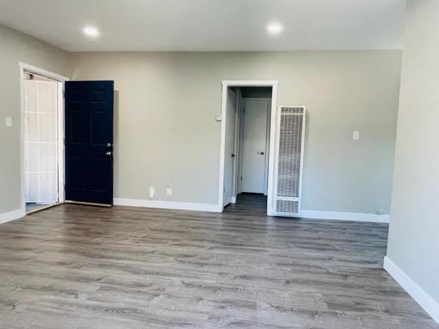 919 Ravenscourt Avenue Campbell, CA 95128 - Photo 3 of 4 a view of an empty room with wooden floor and closet