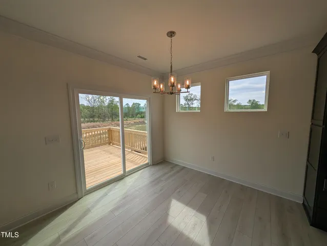 a kitchen with stainless steel appliances a sink and a refrigerator