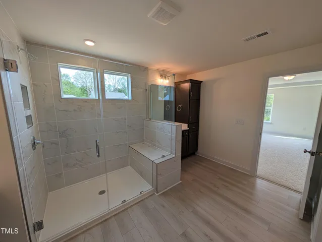 an empty room with windows