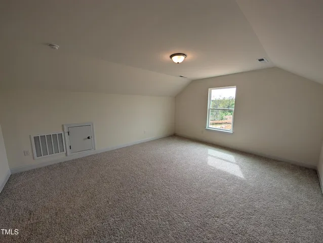 a bathroom with a double vanity sink and mirror