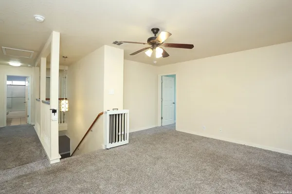 a view of a hallway with closet
