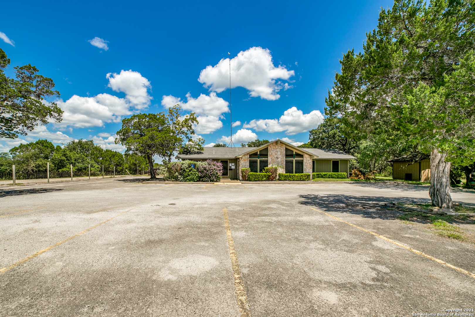 5567 Whartons Dock Road Bandera, TX 78003 - Photo 1 of 1 a view of a house with a yard