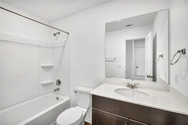 a bathroom with a sink toilet a bathtub and shower