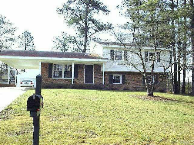 4008 Willow Oak Road Raleigh, NC 27604 - Photo 1 of 1 Brick & Vinyl Split Level W/Carport & Detached 24'x24' Garage Exterior Front