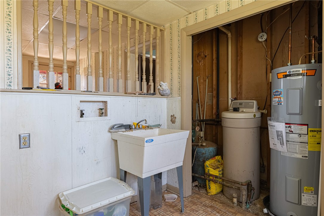 6885 Garber Road Clayton, OH 45415 - Photo 16 of 24 This functional utility space features essential home systems.