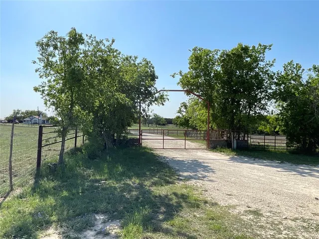 a view of a lake from a yard