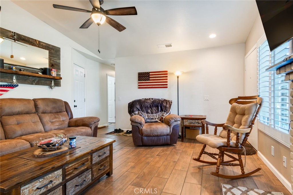 3198 Bexfield Court Riverside, CA 92503 - Photo 3 of 24 Living Room with Ceiling Fan and Recessed Lights