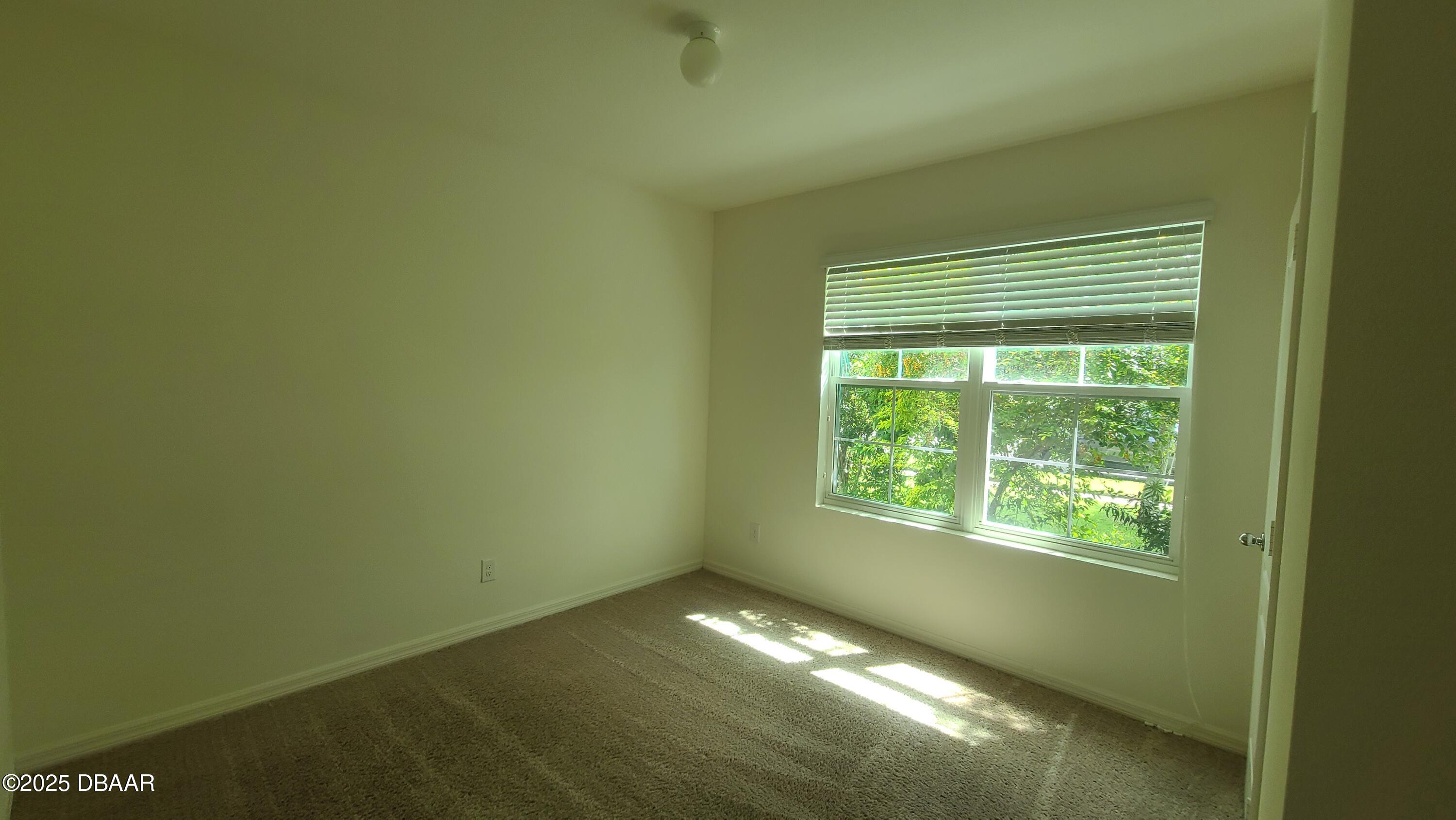 5296 Bear Corn Run Port Orange, FL 32128 - Photo 14 of 31 a view of empty room with window