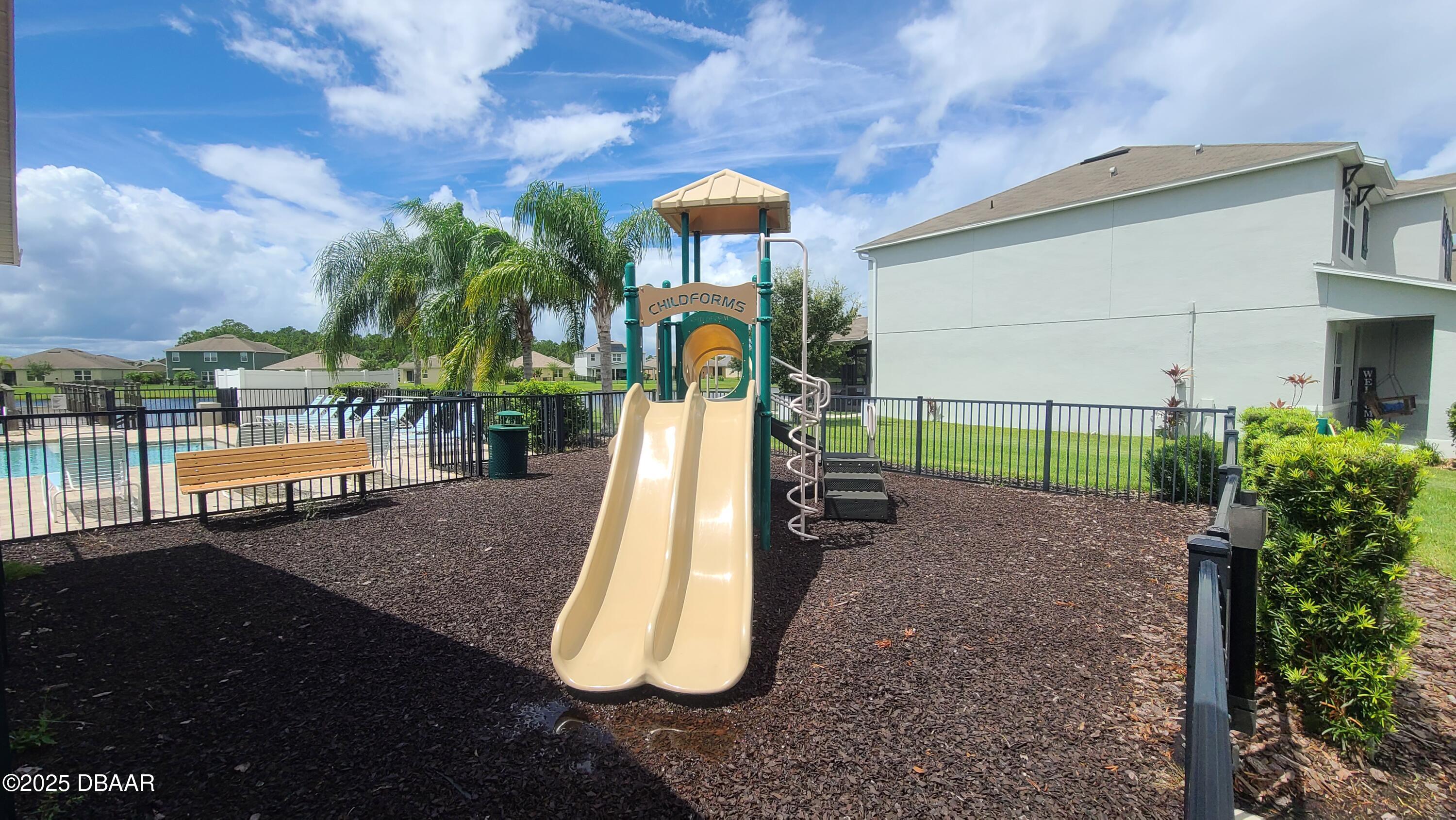5296 Bear Corn Run Port Orange, FL 32128 - Photo 28 of 31 a view of a park with iron fence