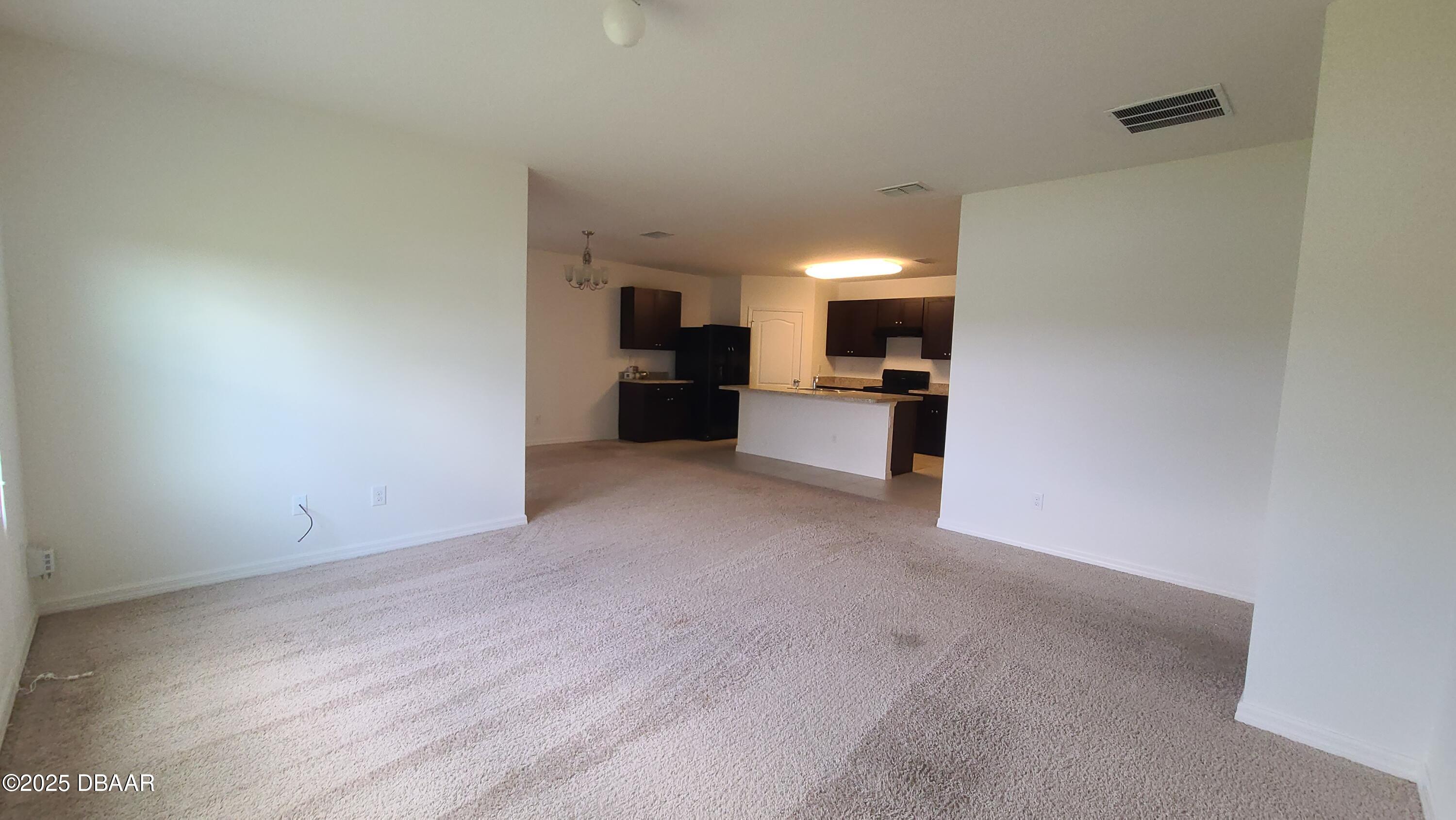 5296 Bear Corn Run Port Orange, FL 32128 - Photo 9 of 31 a view of a kitchen with a sink