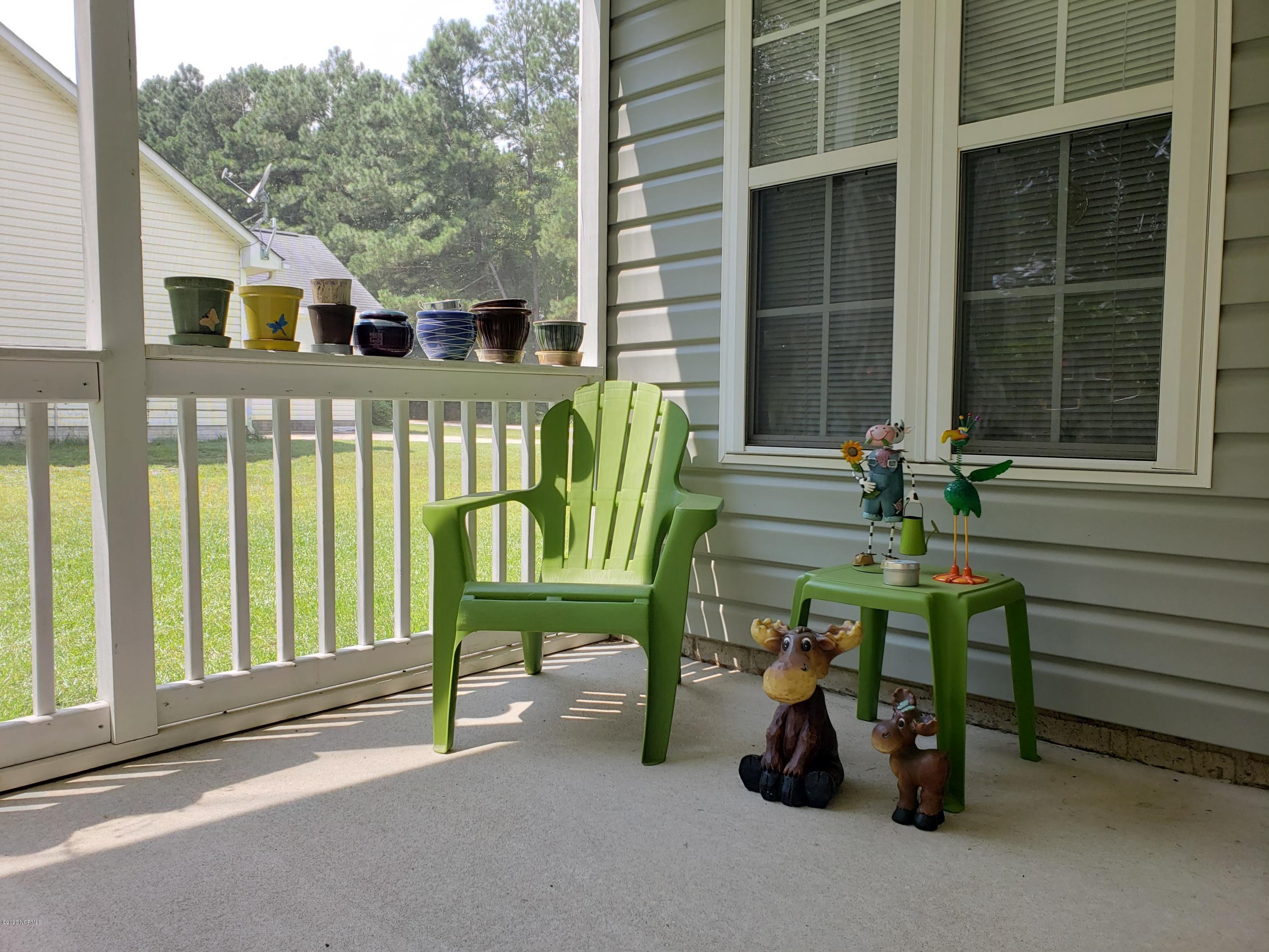 116 Overton Road Raeford, NC 28376 - Photo 4 of 14 Screened porch on rear, perfect to enjoy the private rear yard