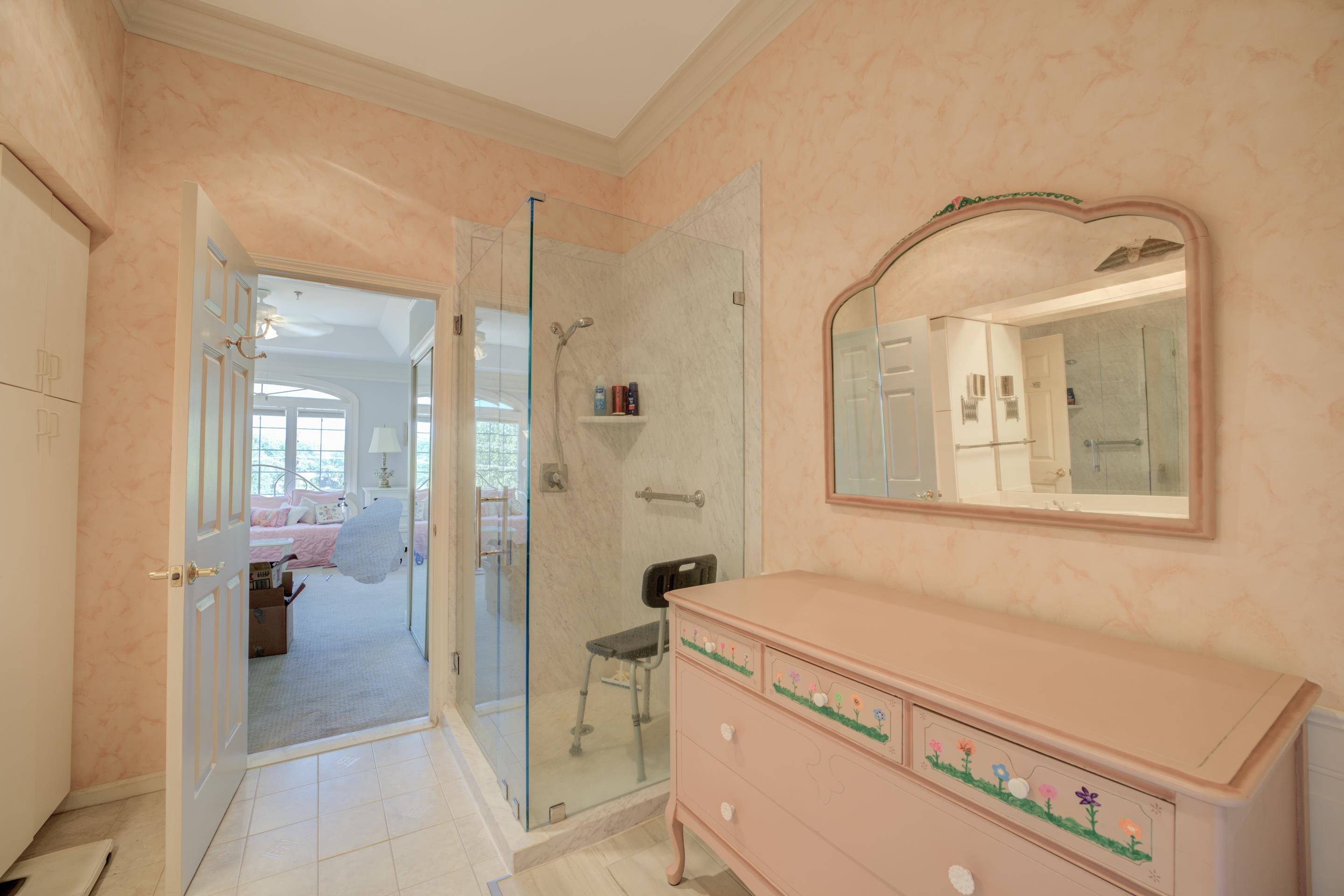 405 South Perkins Road, Unit 450 Memphis, TN 38117 - Photo 13 of 28 a bathroom with a granite countertop sink mirror and shower