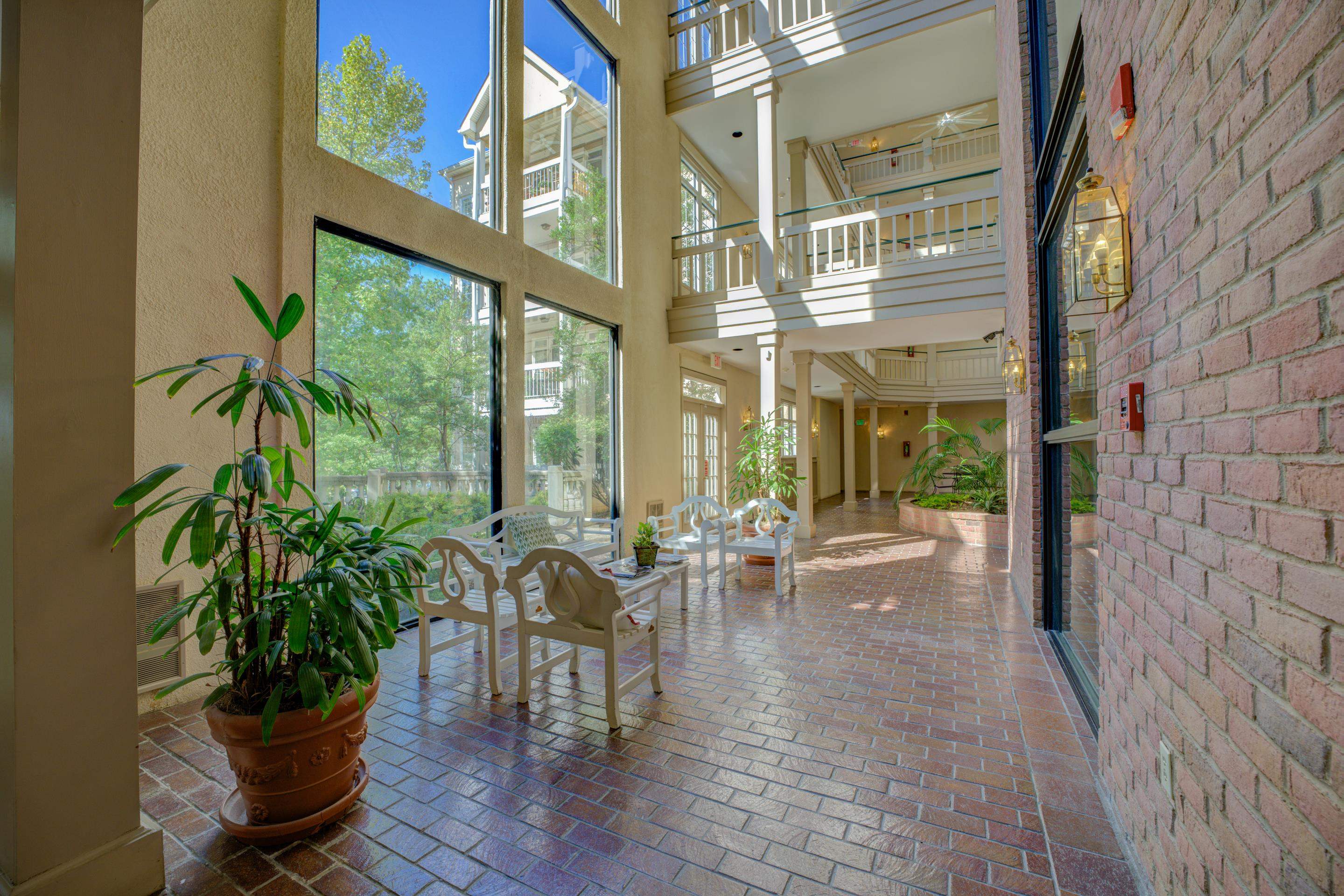 405 South Perkins Road, Unit 450 Memphis, TN 38117 - Photo 20 of 28 a lobby with furniture and floor to ceiling windows