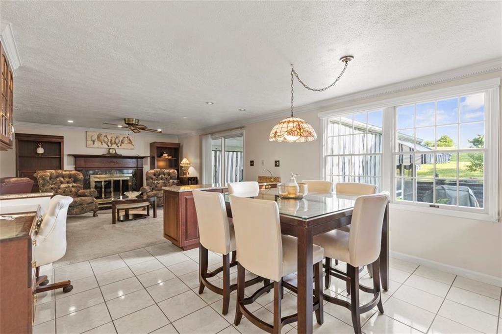 99 Walnut Drive McKees Rocks, PA 15136 - Photo 13 of 50 a view of a dining room with furniture window and outside view