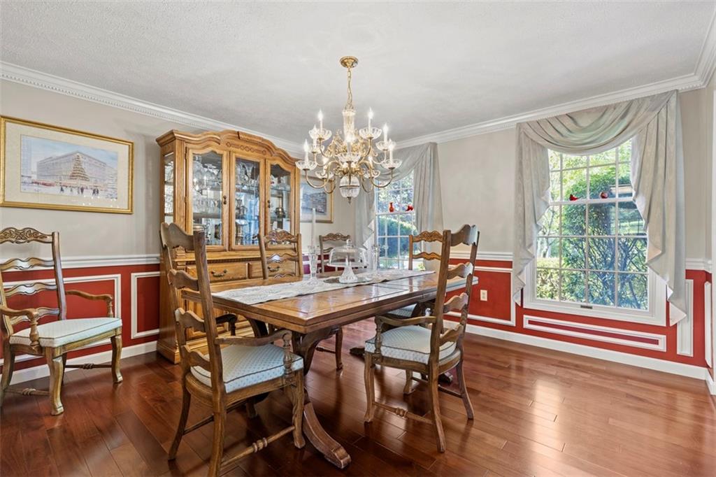 99 Walnut Drive McKees Rocks, PA 15136 - Photo 21 of 50 a view of a dining room with furniture window and wooden floor