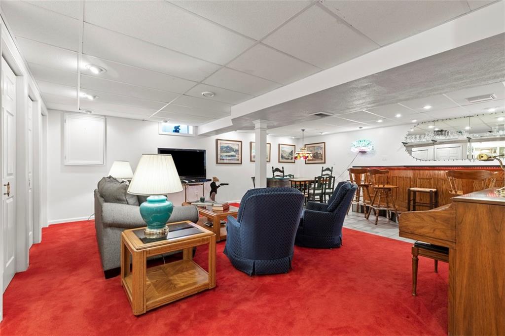 99 Walnut Drive McKees Rocks, PA 15136 - Photo 34 of 50 a living room with furniture window and a flat screen tv