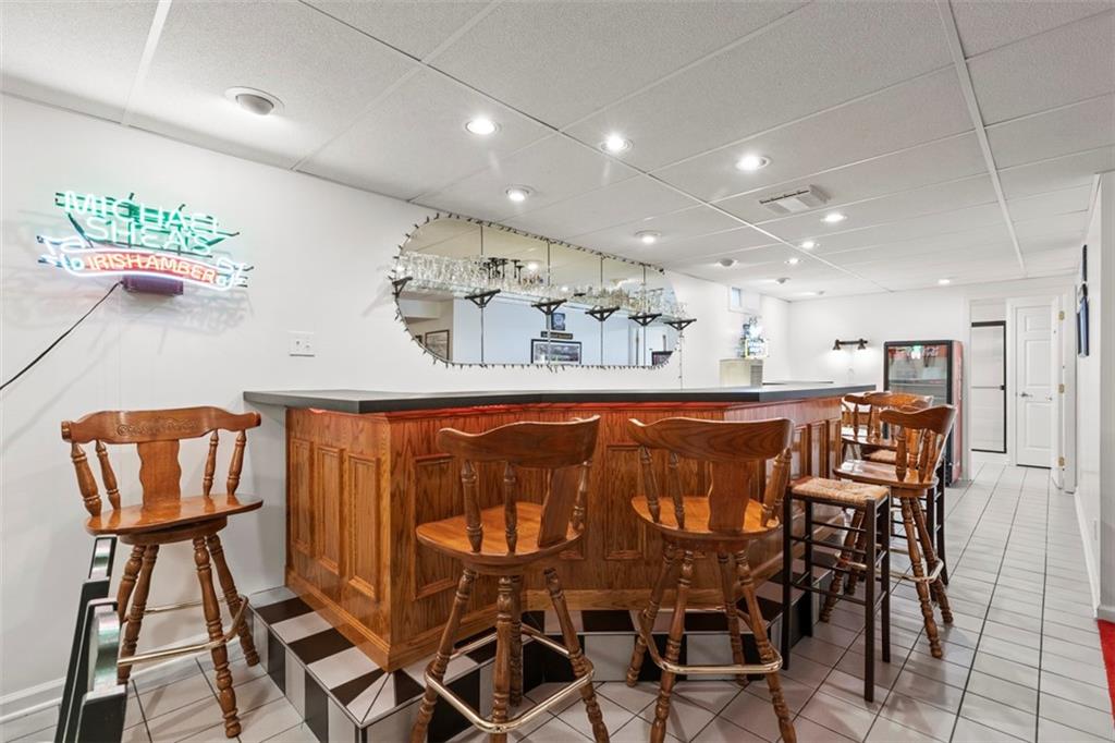 99 Walnut Drive McKees Rocks, PA 15136 - Photo 37 of 50 a view of a dining room with furniture and a potted plant