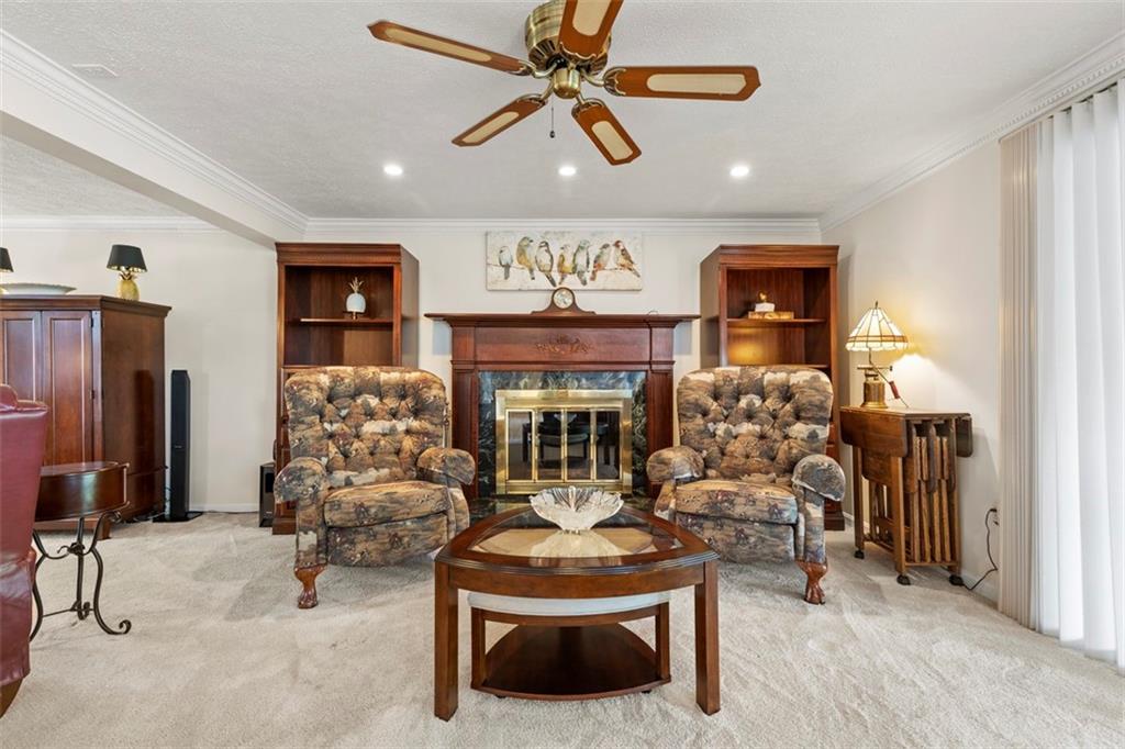 99 Walnut Drive McKees Rocks, PA 15136 - Photo 8 of 50 a living room with furniture a rug and a chandelier