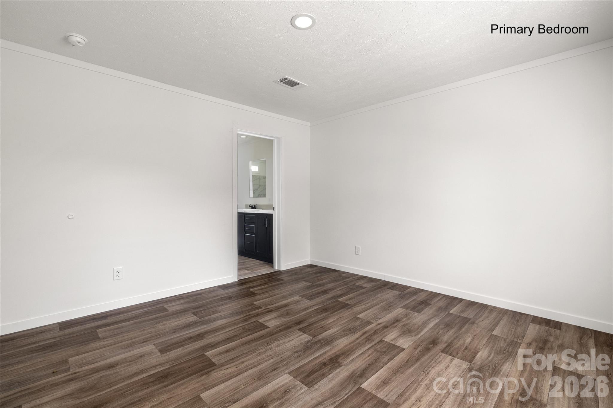 1109 Marion Street Lancaster, SC 29720 - Photo 15 of 44 a view of an empty room with wooden floor and stairs