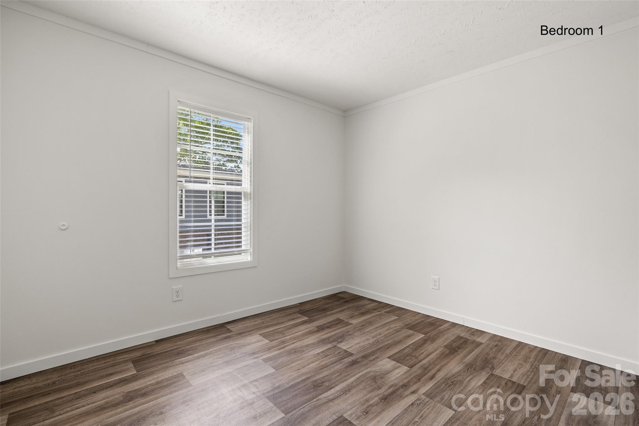 1109 Marion Street Lancaster, SC 29720 - Photo 22 of 44 an empty room with a window
