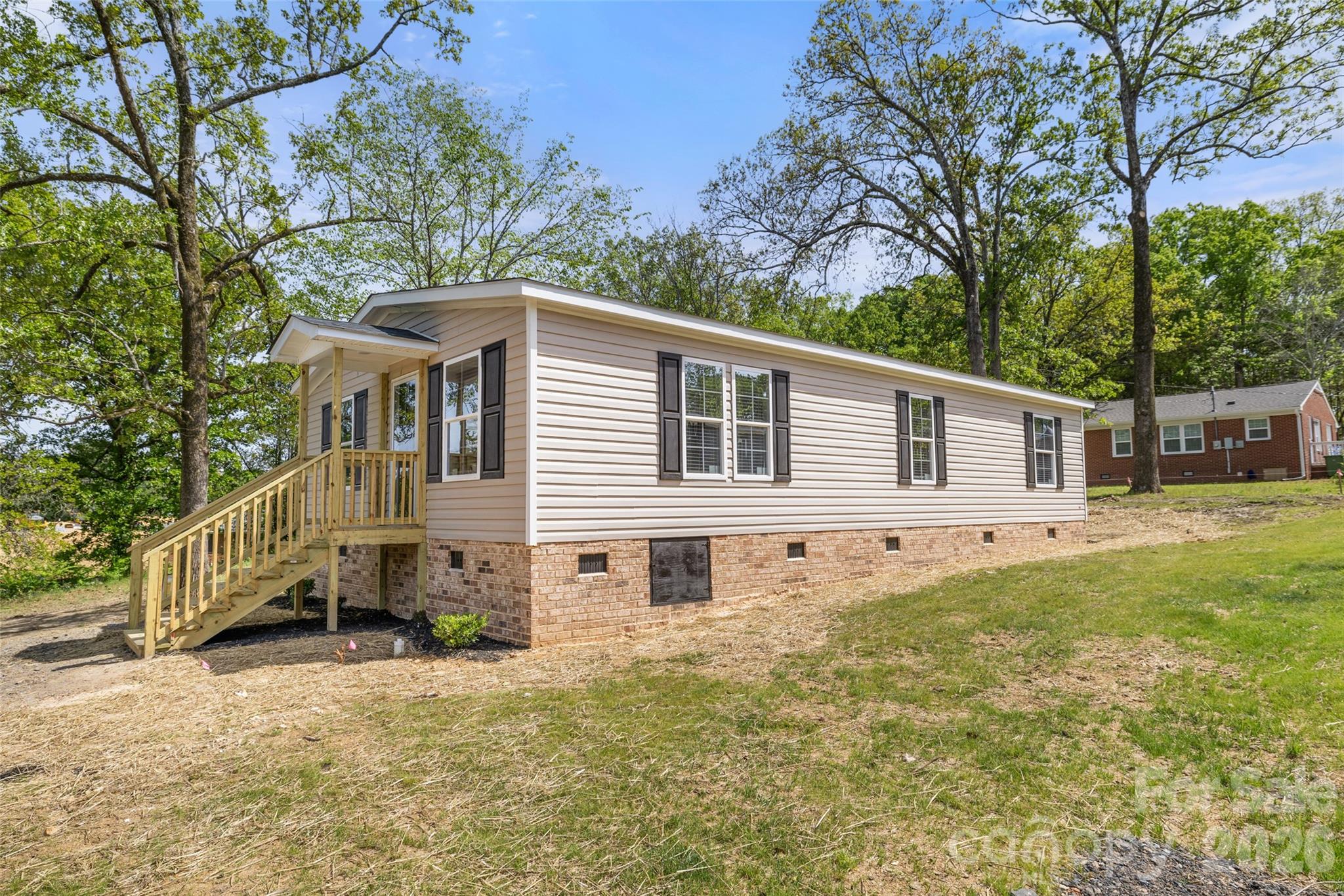 1109 Marion Street Lancaster, SC 29720 - Photo 24 of 44 a view of a house with a yard